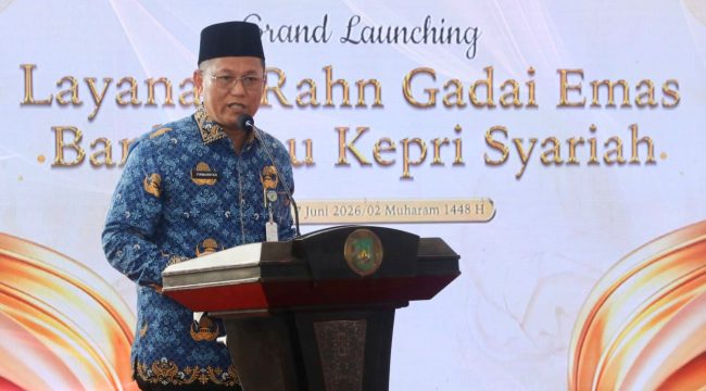 Sekda Kota Batam, Firmansyah, menyampaikan sambutan saat menghadiri Grand Launching Layanan Gadai Emas Rahn di Kantor BRK Syariah Cabang Sei Panas, Batam, Rabu (17/6/2026). 